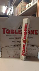 تصویر شکلات سفید تابلرون وزن 100 گرم بسته 20 عددی 
