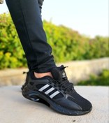 تصویر کتانی مردانه آدیداس کلیماکول رنگ مشکی طلایی با زیره تونلی 