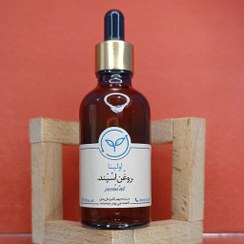 تصویر روغن اسپند خالص و طبیعی اولینا(روغن اسفند تسکین درد گرم کننده بدن درجه یک)50ml 