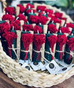 تصویر گیفت یلدایی فال و شمع قرمزرنگ 