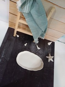 تصویر سینی لبه دفرمه بیضی 