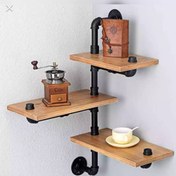 تصویر شلف لوله آب دیواری اهنی با طبقات چوبی 