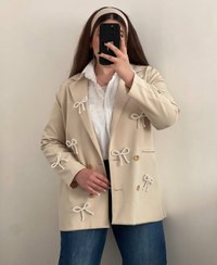 تصویر پاپیون مرواریدی سوزن دار 