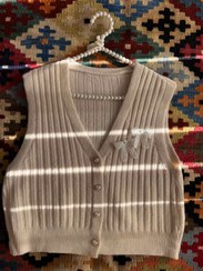 تصویر جلیقه بافت دکمه قلبی - استخونی 