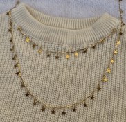 تصویر نیم ست گردنبند و دستبند زنانه استیل طلایی رنگ ثابت مدل پولکی ستاره مشابه طلا - ست گردنبند و دستبند 