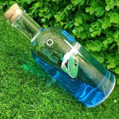 تصویر دکوراتیو بطری کشتی شناور 