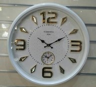 تصویر ساعت دیواری تورنتو مدل ۳۰۴ دوزمانه سایز ۶۰ رنگ سفید 