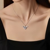 تصویر گردنبند قلب بالدار نقره‌ای با سنگ کریستالی 