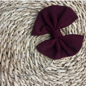 تصویر پاپیون همراه با تل 