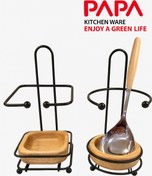 تصویر زیر قاشقی کنار گاز ایستاده پاپا 