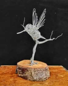 تصویر مجسمه فلزی تزینی پرنده Bird decorative metal sculpture