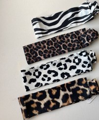 تصویر هدبند پارچه ای طرحدار - پلنگی سیاه سفید ( سومی از بالا) 