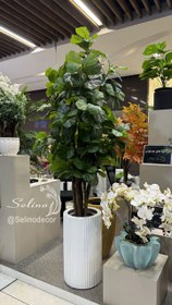 تصویر گلدان چوبی MDF استوانه شیاردار طرح میله ای 