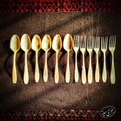 تصویر سرویس قاشق و چنگال برنجی قدیمی 