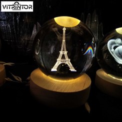 تصویر چراغ خواب گوی کریستالی طرح برج ایفل با پایه چوبی 