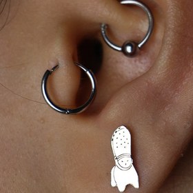 تصویر پیرسینگ نقره گربه کراکسی 