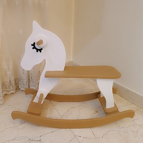 تصویر راکر چوبی طرح اسب رنگ شده مناسب اسباب بازی و سیسمونی کودک رنگاچوب 