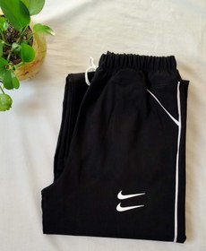 تصویر شلوار زنانه بغل خط دار نایک کد ۲۰۷۹ Woman's Nike pants 2079