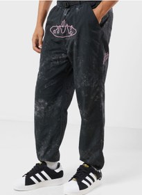 تصویر شلوار ورزشی نایلونی تریکو با طرح رنگی ذوب شده برند grimey Melted Stone Nylon Tie And Dye Track Pants