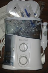 تصویر دستگاه شست و شوی دهان و دندان (نایس فیل) Oral irrigator