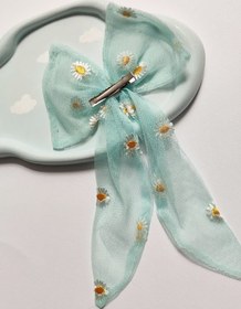 تصویر گیره مو زنانه طرح پاپیون و بابونه 