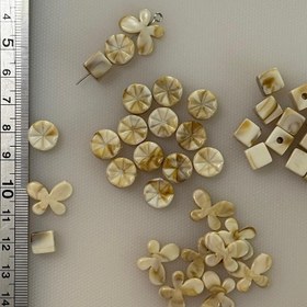 تصویر مهره بین کاری طرح سنگ پروانه و مکعب و گرد 