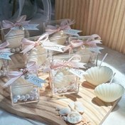 تصویر گیفت عروسی و نامزدی مدل شمع صدف - ب Engagement and wedding gift, seashell candle model