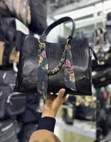 تصویر کیف زنانه ورنی مجلسیکیف زنانه ورنی مجلسی Cloth strap women's bag