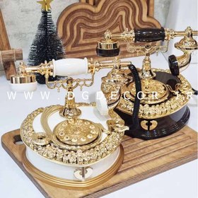 تصویر تلفن کوکی موزیکال در دو رنگ 