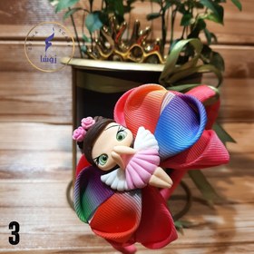 تصویر تل عروسکی 