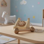 تصویر تلفون چوبی اسباب بازی کودک 