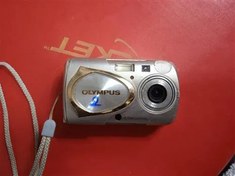 تصویر دوربین olympus 410 