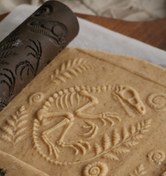 تصویر وردنه طرح فسیل دایناسور 