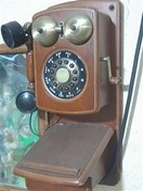 تصویر تلفن دیواری آنتیک بسیار زیبا 