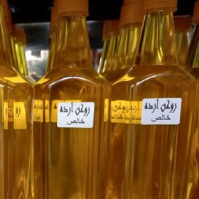 تصویر روغن ارده کنجد شهباز میرزا دارای نشان اعلای سلامت و تضمین کیفیت و مرجوع در صورت عدم نارضایتی مشتری و استرداد ضرر و زیان 