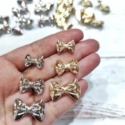 تصویر دکمه دفرمه طرح پاپیون(سه سایز) 