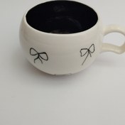 تصویر ماگ سرامیکی پاپیونی مشکی 