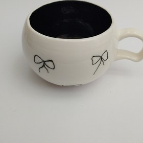 تصویر ماگ سرامیکی پاپیونی مشکی 