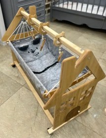 تصویر گهواره ی نوزادی مدل کلبه 