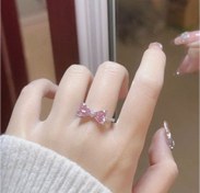 تصویر انگشتر جواهری صورتی پاپیون صورتی 