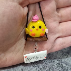 تصویر آویز ماشین جوجه کلاه صورتی 