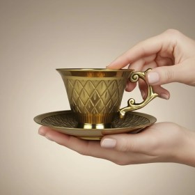 تصویر فنجان برنجی طرح‌دار 