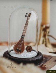 تصویر گوی شیشه ای سه تار 