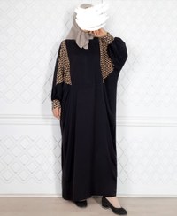 تصویر مانتو زنانه مدل پروانه | کرپ الیزه با ترکیب کرپ کرم، آستین مچ‌دار و زیپ مخفی – فری سایز، قد ۱۴۵ سانت – مشکی و کرم کد ۱۴۰۴۶