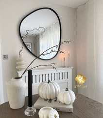 تصویر آینه دکوراتیو مدل کره دفرمه ابعاد ۱۱۰ با چوب مراکشی 