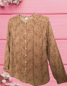 تصویر شومیز زنانه شیک دکمه دار با طرح پلنگی | بهترین انتخاب برای استایل های متنوع Stylish women's blouse with leopard design The best choice for various styles