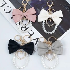 تصویر جاکلیدی پاپیونی قلبی مرواریدی 