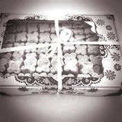 تصویر شیرینی نخودچی زعفرانی ،به وزن خالص 883 گرم 