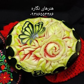 تصویر حکاکی هندوانه،طرح پروانه،وزن حدودا 6-8کیلو 