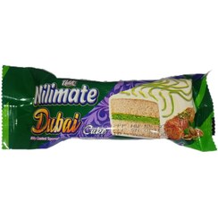 تصویر کیک لایه ای نیلی میت با کرم پسته و روکش سفید – طعم ناب و خوشمزه Nili Meet Layer Cake with Pistachio Cream and White Coating